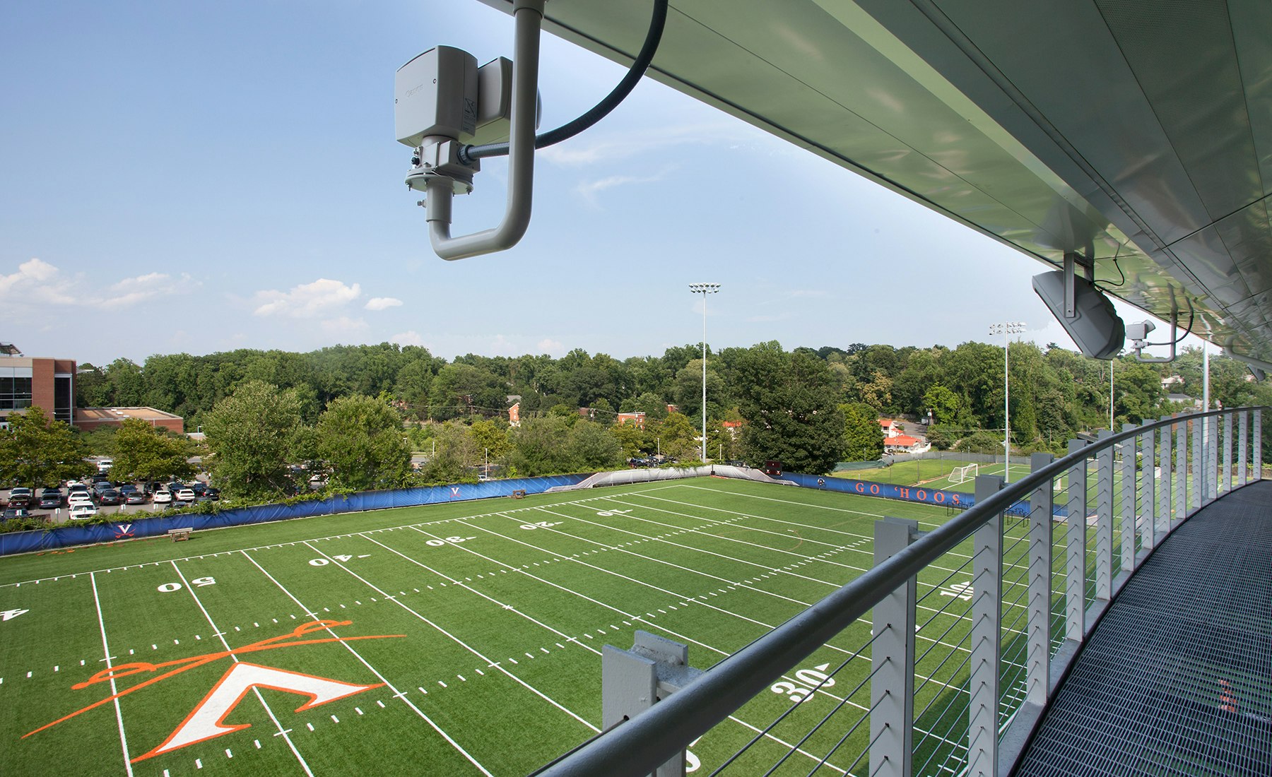 The single story, open volume facility features a small central platform for viewing by coaches and filming.